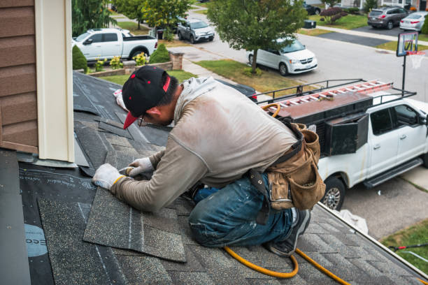 Professional Emergency Roof Repair technician working in Hollsopple, PA